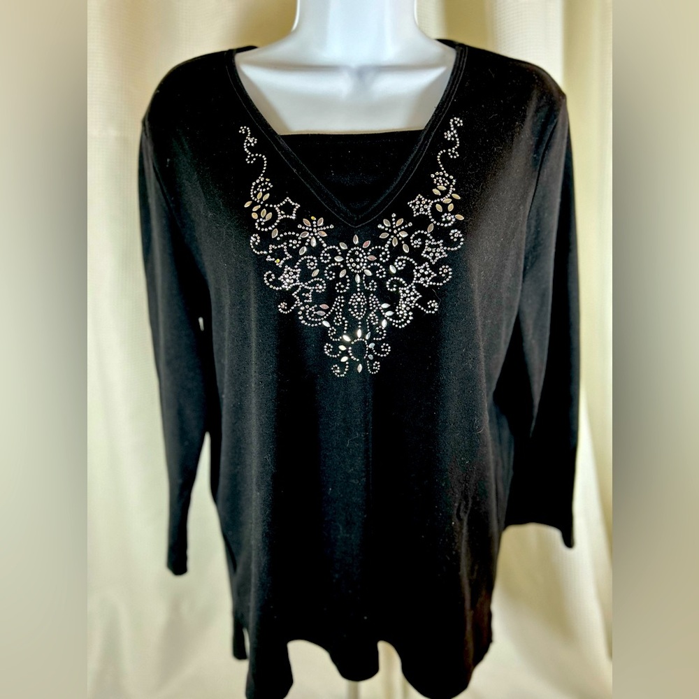Classic elements, V-neck, black color, embellished, silver design on front